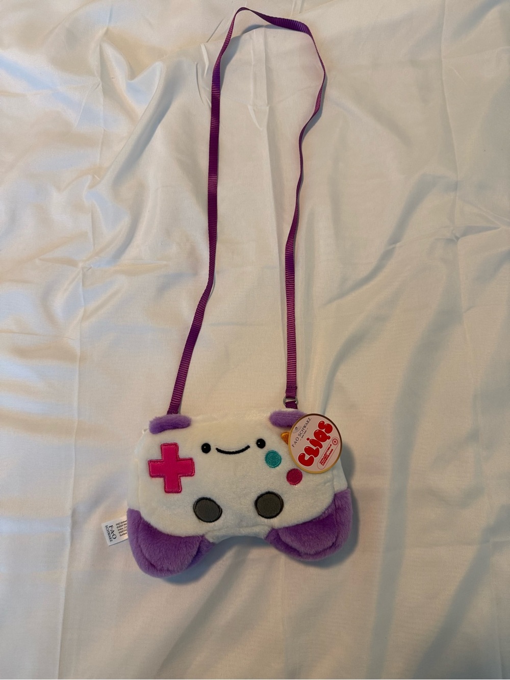 FAO Schwarz Plush Game Controller Crossbody Bag - Purple, White, Pink